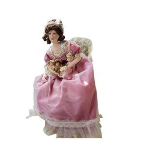 Porcelain Doll and Chair